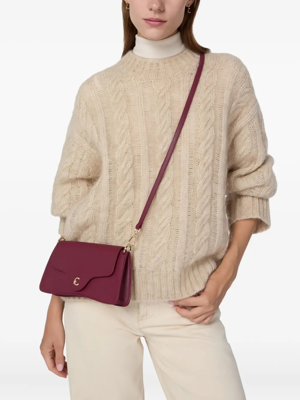 Coccinellecurved-flap shoulder bag
