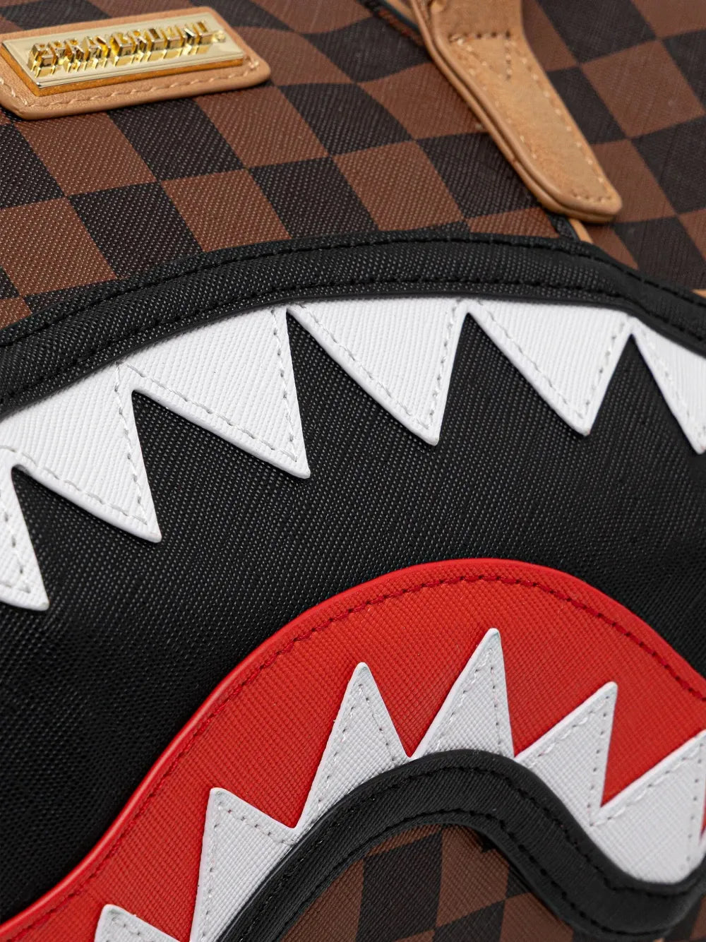 Spraygroundchecked-pattern luggage bag