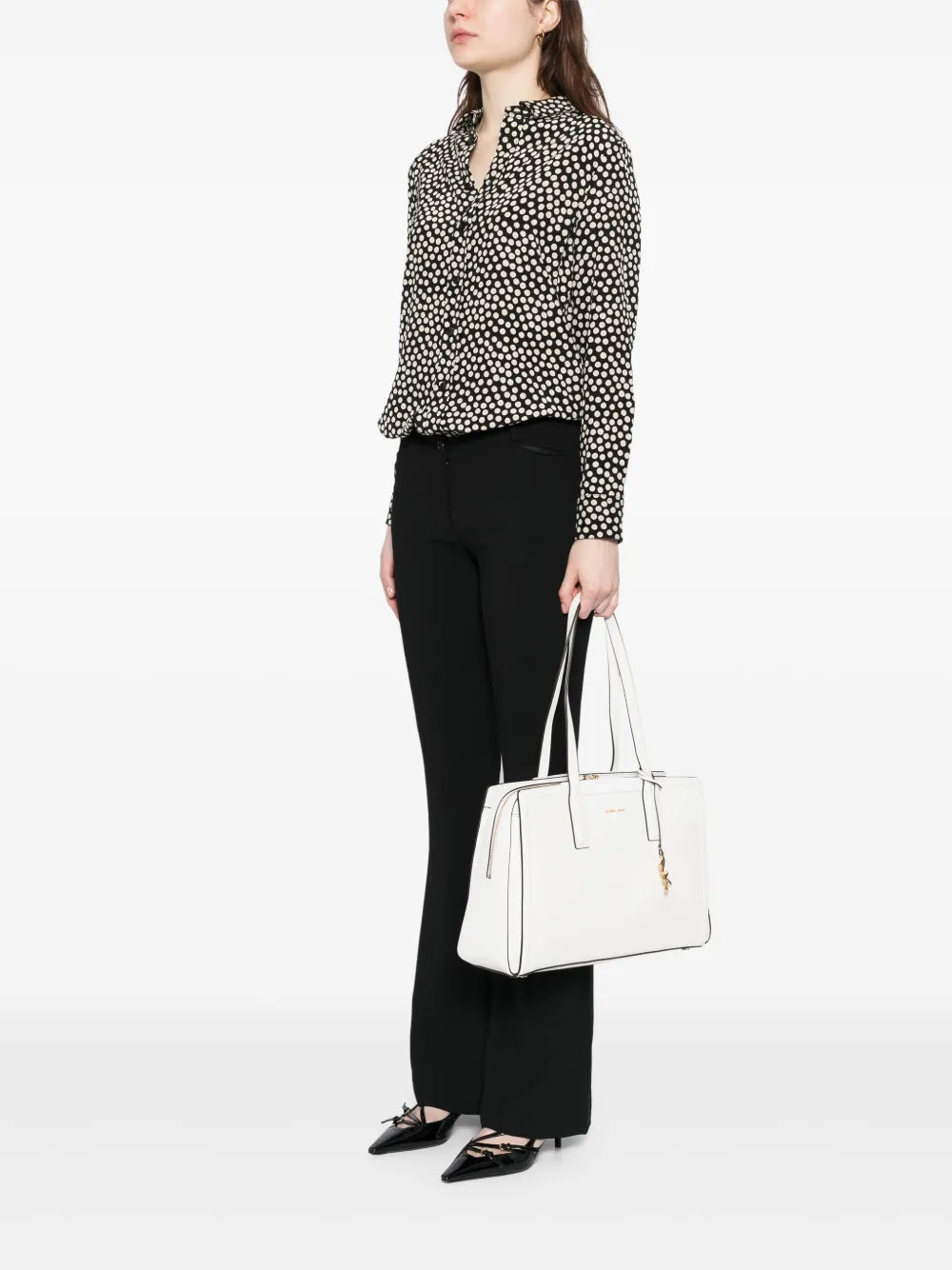 Michael Korstop handles tote bags