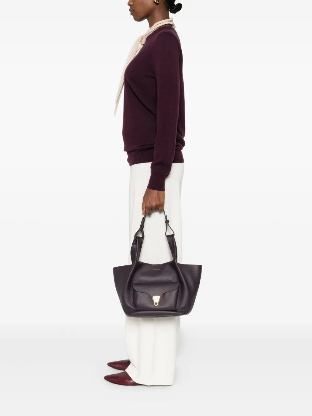 Coccinelleknotted-handle leather shoulder bag