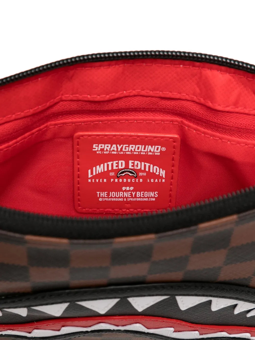 SpraygroundSharks in Paris clutch bag