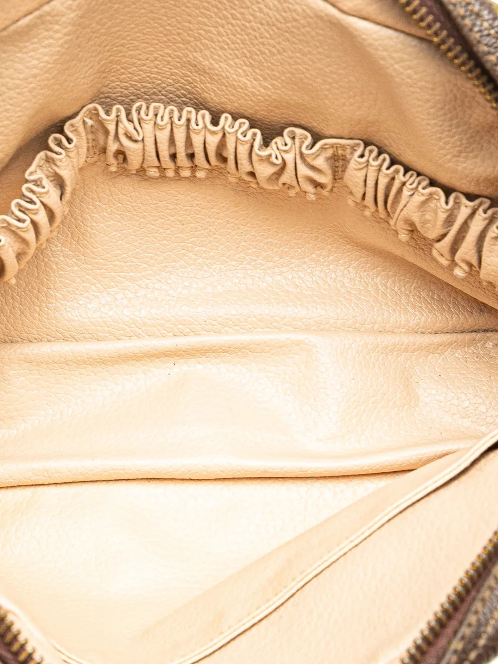 Pre-OwnedLouis Vuitton Pre-Owned1990-2025 Monogram Trousse Toilette 23 clutch bag